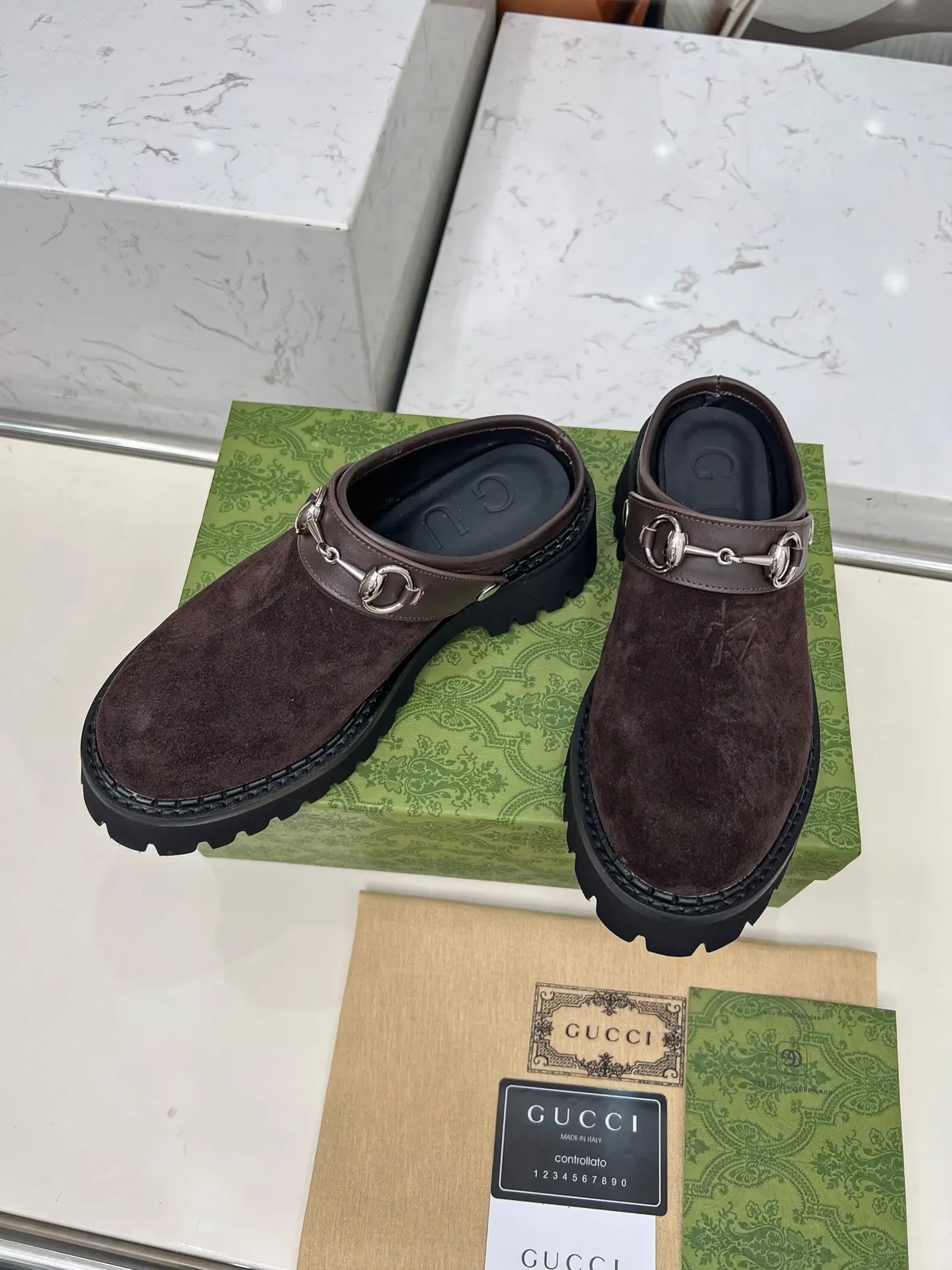 👟👟Ex-factory price 480👟👟 GUCCI British-style fashion slippers, lazy design back stumbling ➕thick sole increased height, empty back shape looming with exposed ankles, super cool when walking, age-neutral style, wide audience, Fabric: cowhide, mercerized cow suede Lining/foot pad: cowhide Outsole: foam outsole Heel height: 5cm Number of yards: 35-42 (customized numbers at both ends) Color: 4 colors available: black, brown, and military green Packing: card, bag